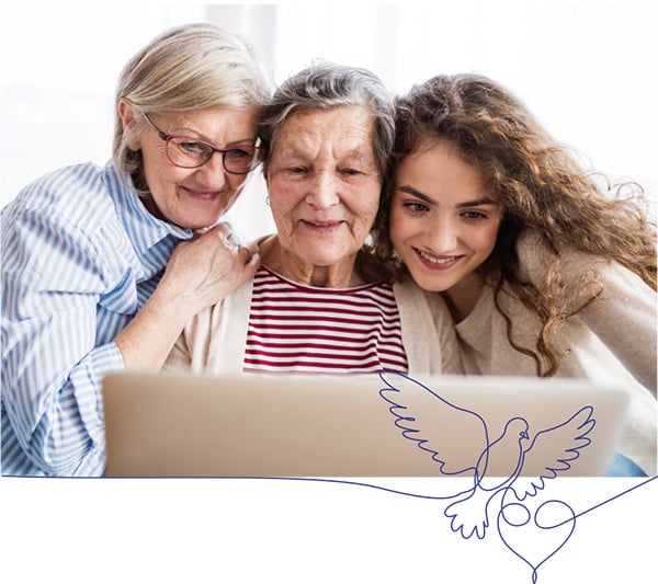 Three family memebers watching a funeral service stream on a laptop Three family memebers watching a funeral service stream on a laptop